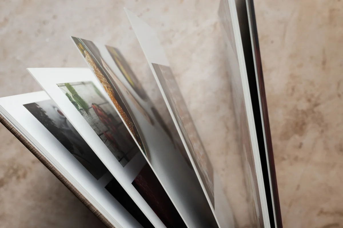 Glossy magazine editorial print stack representing premium editorial placement investment